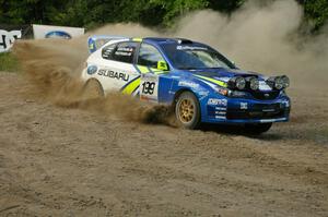 Travis Pastrana / Christian Edstrom in their Subaru WRX STi blast through the spectator hairpin on SS4.