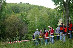 Andi Mancin / Maciej Wislawski in their Mitsubishi Lancer Evo 9 at speed toward a spectator corner on SS4.