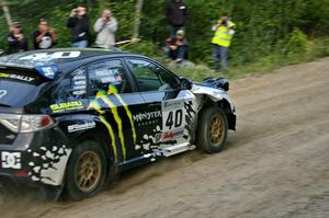 Dave Mirra / Derek Ringer head uphill in their Subaru WRX STi on SS4.