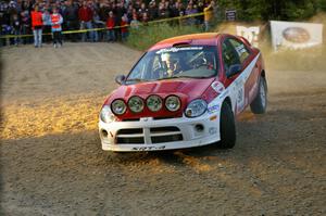 Lauchlin O'Sullivan / Karen Wagner fling their Dodge SRT-4 up onto three wheels at the hairpin on SS4.