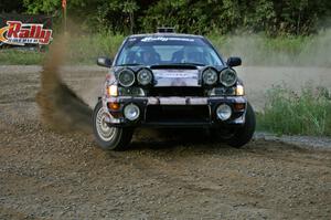 Bob Olson / Conrad Ketelsen get back on the gas of their Subaru Impreza at the spectator hairpin on SS4.