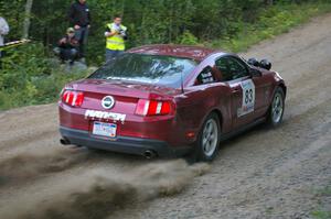 Mark Utecht / Rob Bohn in their Ford Mustang blast uphill after the spectator hairpin on SS4.