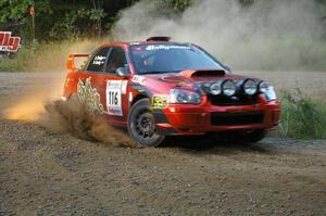 Nate Conley / Adam Kneipp perfectly nail the spectator hairpin in their Subaru WRX STi on SS4.