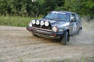 Chris Duplessis / Catherine Woods set up for the uphill hairpin on SS4 in their VW GTI.