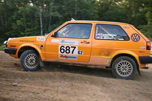 Chad Eixenberger / Ben Slocum muscle their VW Golf uphill at the spectator hairpin on SS4.