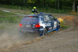 Paul Koll / Heath Nunnemacher do a perfect apex of the uphill hairpin on SS4 in their VW Golf.