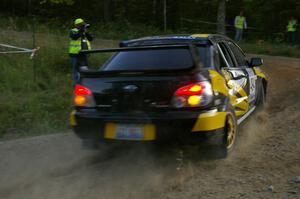 Roman Pakos / Maciej Sawicki sport recent damage on their Subaru WRX STi on SS4 after hitting a tree.