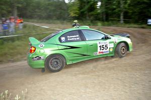 John Conley / Keith Rudolph drive their Dodge SRT-4 uphill at the spectator hairpin on SS4.