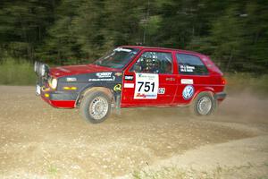 The John Kimmes / Greg Smith VW GTI heads uphill at the SS4 spectator hairpin.
