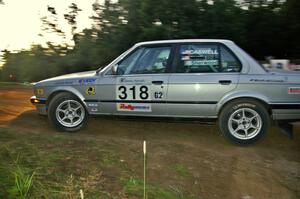 Bill Caswell / Elliot Sherwood in their BMW 318i head uphill at the spectator hairpin on SS4.