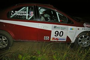 Lauchlin O'Sullivan / Karen Wagner drive their Dodge SRT-4 at speed through a right hander on SS6.