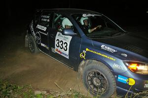 Wyatt Knox / Martin Headland fly through a 90-right on SS6 in their Mazda Speed 3.