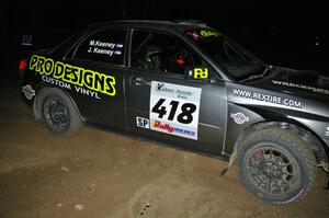 Jimmy Keeney / Missy Keeney at speed through a 90-right on SS6 in their Subaru WRX STi.