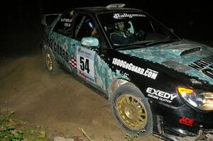 Mark Fox / Jake Blattner apex a 90-right closely on SS6 in their Subaru WRX STi.