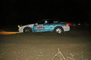 Adam Markut / Chris Gordon set up their Eagle Talon for the spectator-filled downhill hairpin on SS7.