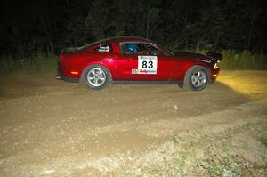 Mark Utecht / Rob Bohn blast away from the downhill hairpin on SS7 in their Ford Mustang.