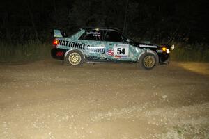 Mark Fox / Jake Blattner drift wide out of the downhill hairpin on SS7 in their Subaru WRX STi.