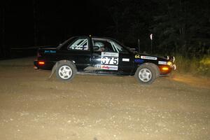 Ben Hanka / Greg Hanka drift wide at the downhill hairpin spectator location on SS7 in their Nissan Sentra SE-R.