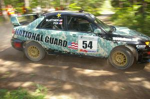 Mark Fox / Jake Blattner fight understeer out of a 90-right on SS8 in their Subaru WRX STi.