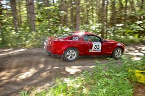 Mark Utecht / Rob Bohn rocket out of a 90-right on SS8 in their Ford Mustang.