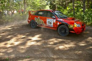 Nate Conley / Adam Kneipp drift wide in their Subaru WRX STi on SS8.
