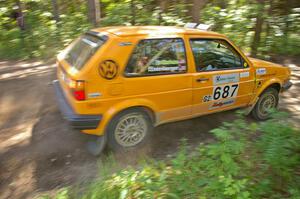 Chad Eixenberger / Ben Slocum blast out of a 90 right hander in their VW Golf on SS8.