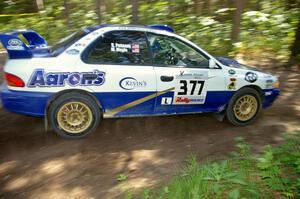 The Mason Moyle / Scott Putnam Subaru Impreza comes out of a 90 right on SS8.