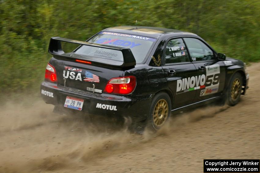 Pat Moro / Jeremy Wimpey slide through a fast left-hander in their Subaru WRX STi on the practice stage.