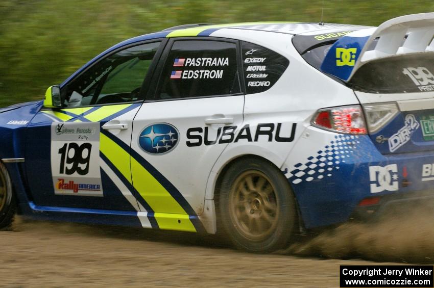 The Travis Pastrana / Christian Edstrom Subaru WRX STi powers out of a right-hander on the practice stage.
