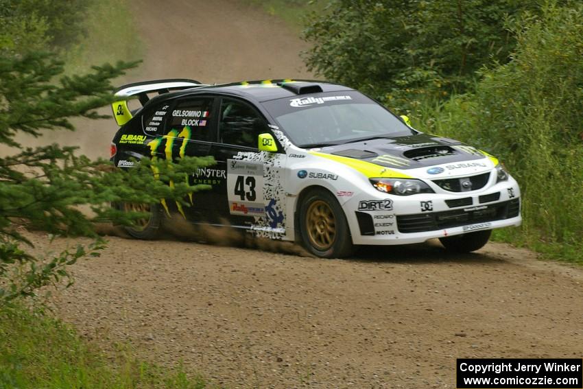 Ken Block / Alex Gelsomino set up for a left hander in their Subaru Impreza WRX STi on the practice stage.