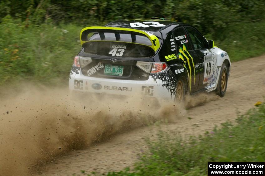 Ken Block / Alex Gelsomino rocket out a left hander in their Subaru Impreza WRX STi on the practice stage.