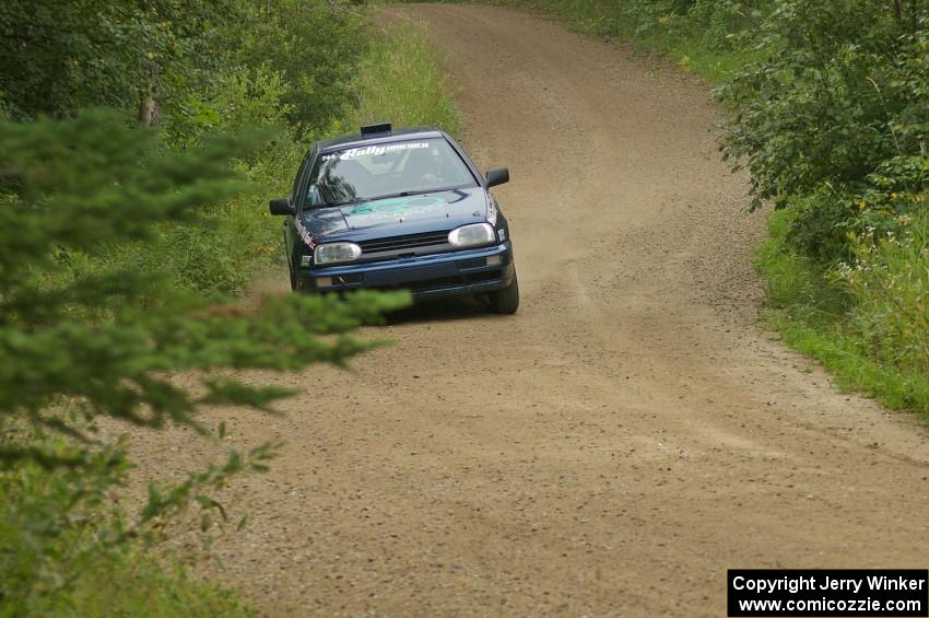 Paul Koll / Heath Nunnemacher set up for fast left-hander on the practice stage in their VW Golf.