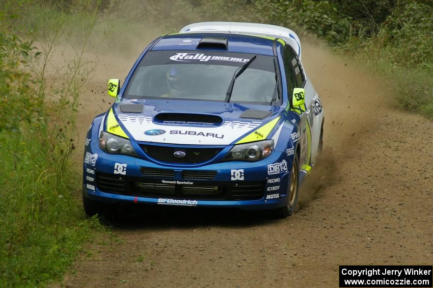 Travis Pastrana / Christian Edstrom blast past in their Subaru WRX STi on a right-hander on the practice stage.