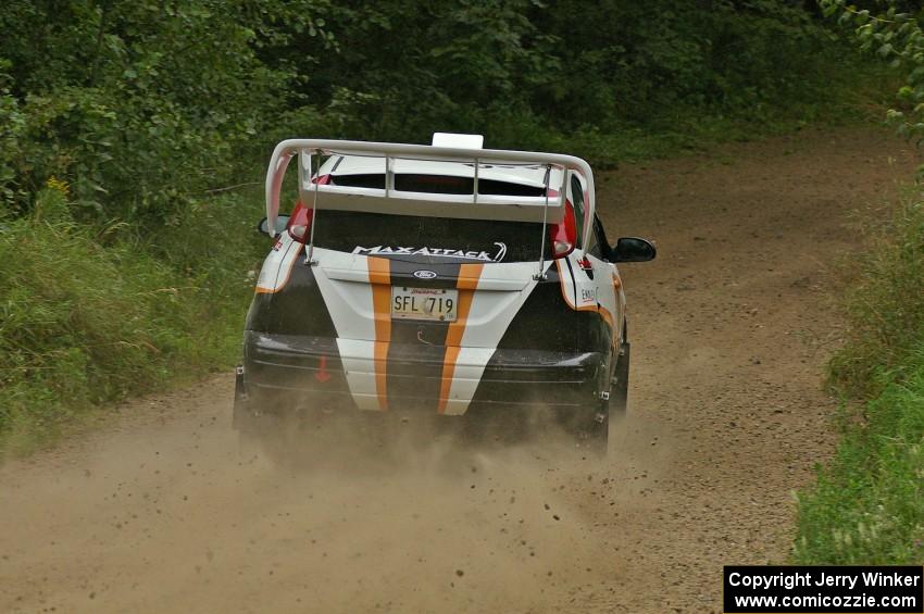 Dillon Van Way / Josh Knott blast their Ford Focus out of a left-hander on the practice stage.