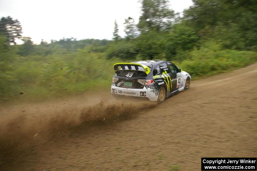 Ken Block / Alex Gelsomino drift their Subaru Impreza WRX STi perfectly on the practice stage.