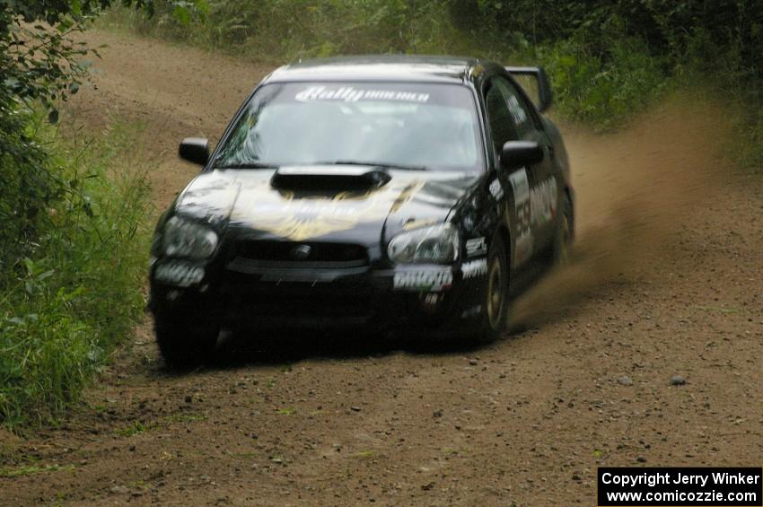 Pat Moro / Jeremy Wimpey drift their Subaru WRX STi out of a corner on the practice stage.