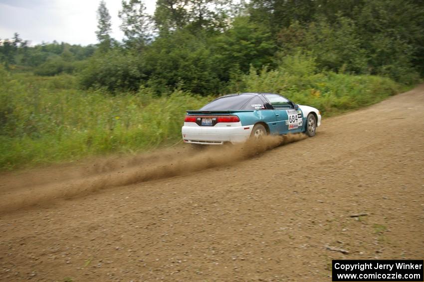 Adam Markut / Chris Gordon do a faster drift in their Eagle Talon than on previous practice attempts.