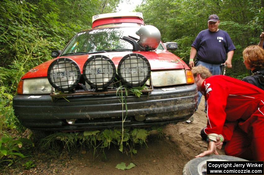 The Paul Donlin / Elliot Sherwood Ford Escort with a skidplate full of leaves after the practice stage.