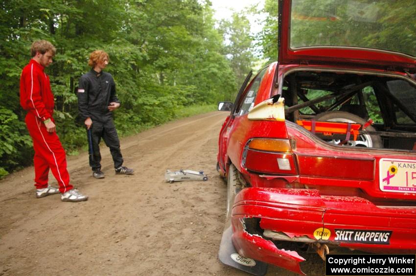 Paul Donlin / Elliot Sherwood Ford Escort after practice. The bumper sticker says it all!