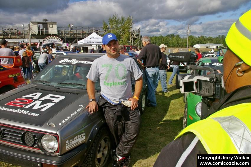 Chris Duplessis is interviwed by Bill Wood. Chris competed with Catherine Woods as his navigator in his VW GTI.