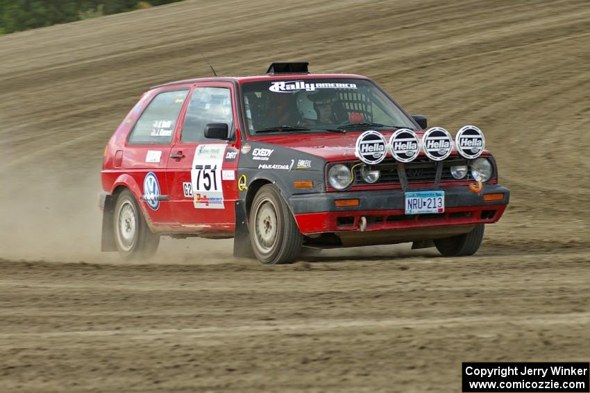 John Kimmes / Greg Smith VW GTI on the high bank on SS1.