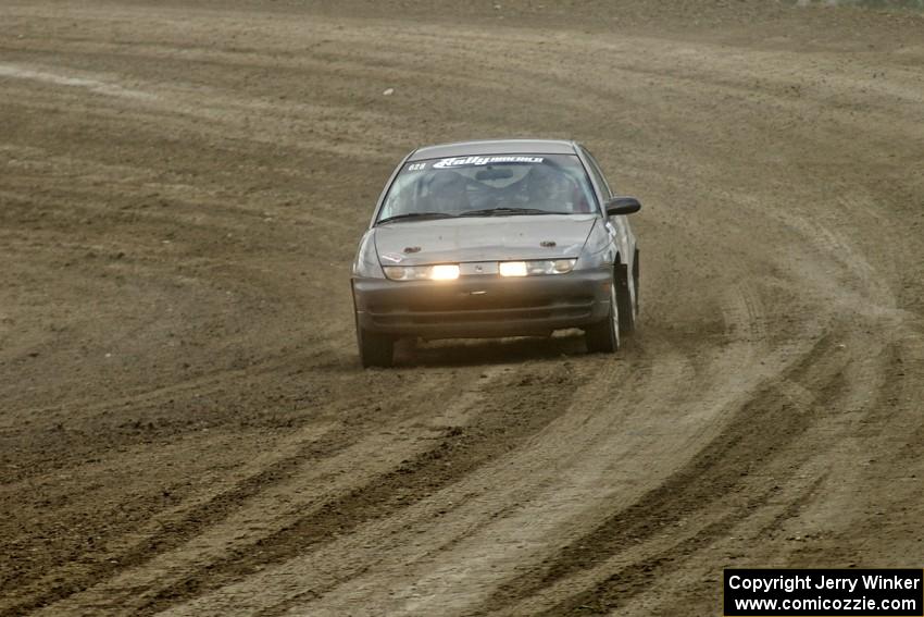 Dan Adamson / Jeremiah Schubitzke Saturn SL2 blast down the final stretch of SS1.