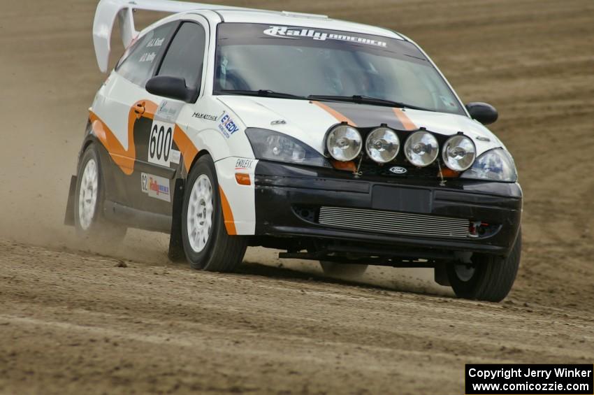 Dillon Van Way / Josh Knott blast their Ford Focus along the high bank on SS1.