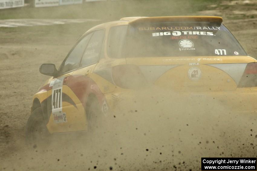 Don Conley / Chris Herlache throw a spray of gravel in their Subaru WRX Wagon on SS1.