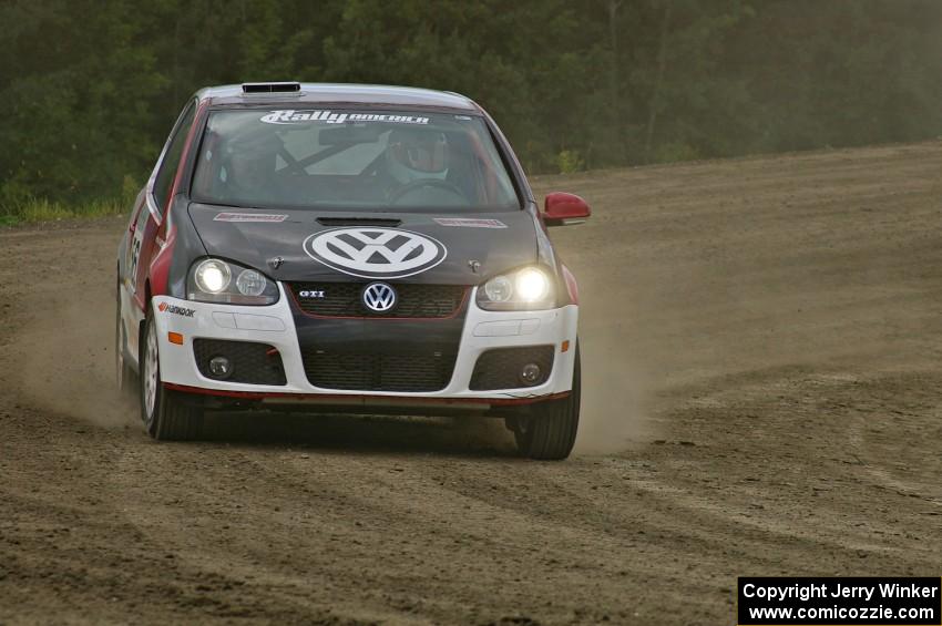 Brian Dondlinger / Dave Parps at the top of the high bank on SS1 in their VW GTI-Rally.