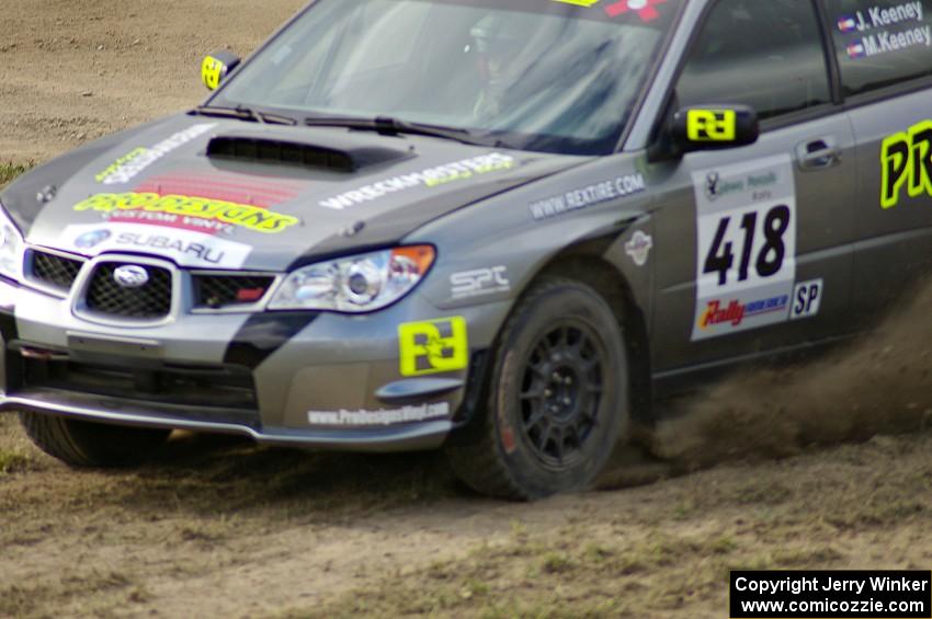 Jimmy Keeney / Missy Keeney in their Subaru WRX STi at the speedway stage, SS1.