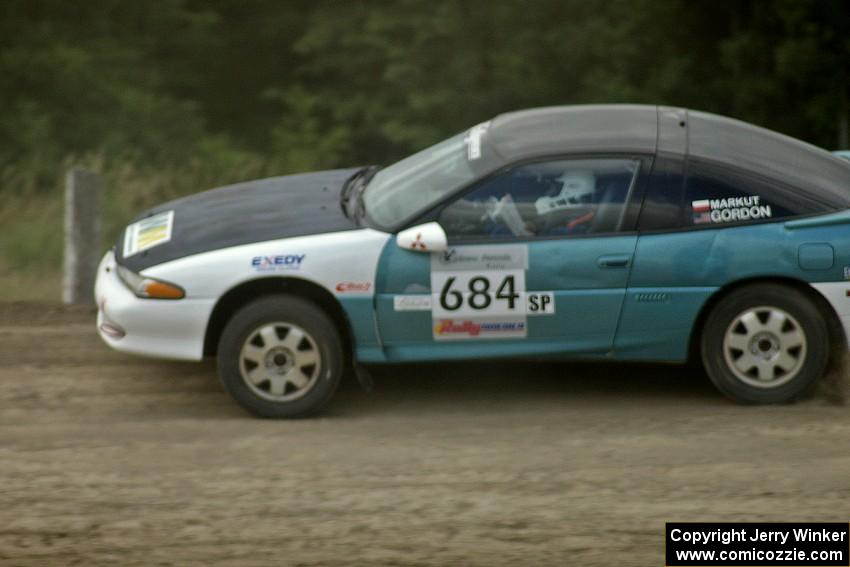 Adam Markut / Chris Gordon jump their Eagle Talon onto the racetrack on SS1.