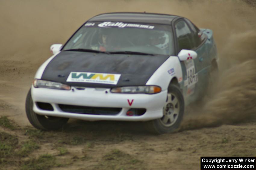 Adam Markut / Chris Gordon drift their Eagle Talon through the infield on SS1.