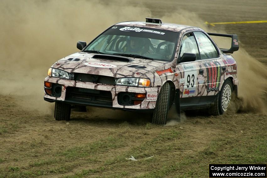 Bob Olson / Conrad Ketelsen take their Subaru Impreza through the infield of the speedway on SS1.