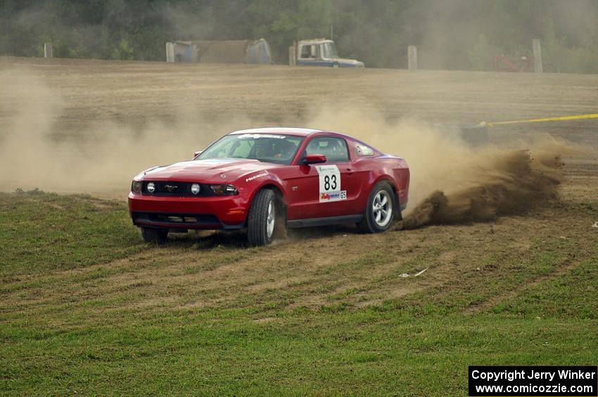 Mark Utecht / Rob Bohn sling dirt on SS1 in their Ford Mustang.